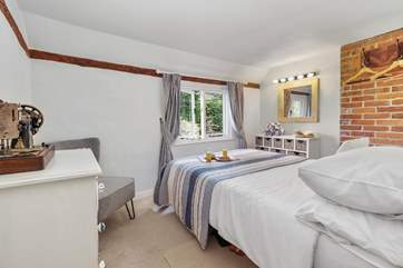 The main bedroom oozes character.