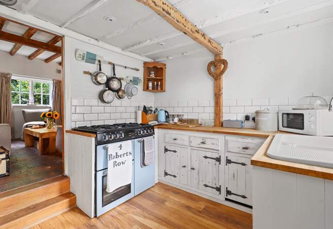 The country-style kitchen with range cooker has everything you need to  create that special meal.