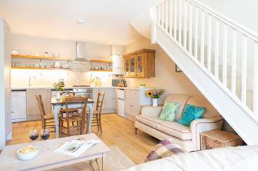 The open plan ground floor has space to relax, cook and eat together.