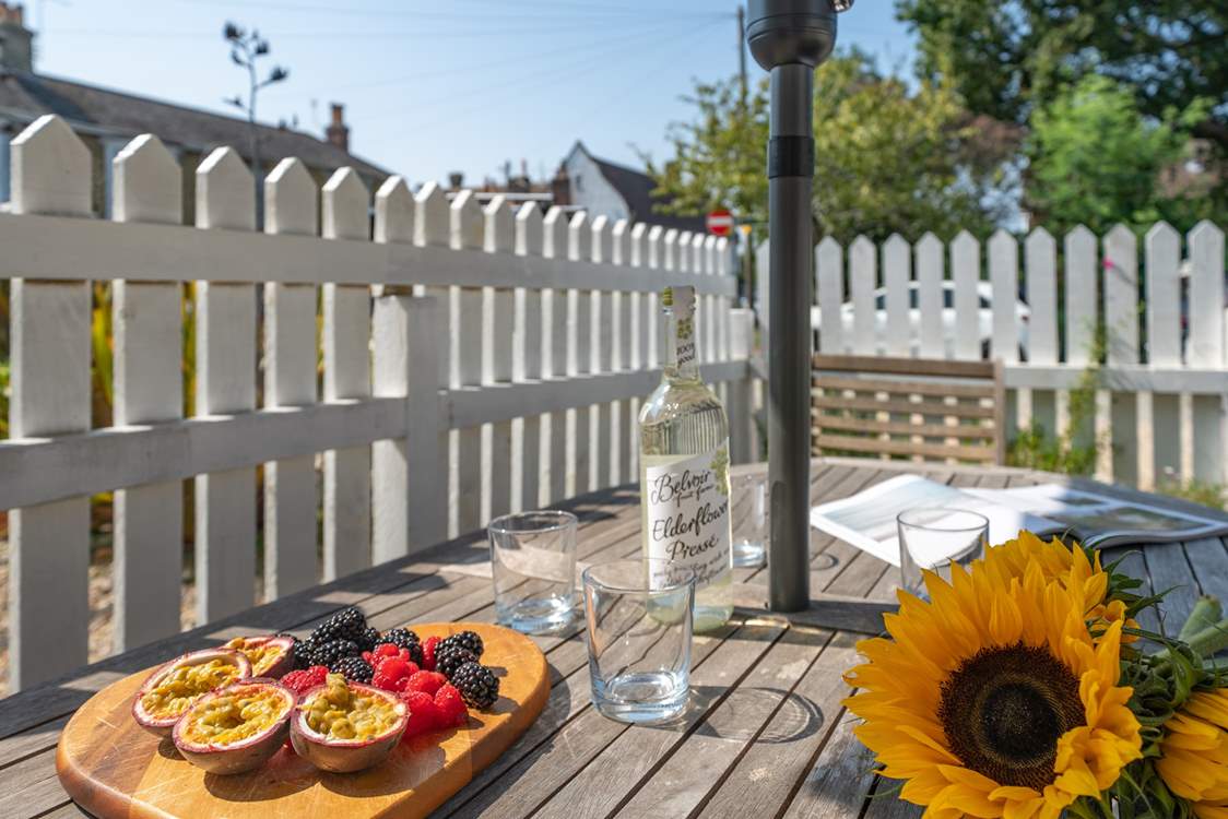 The terrace to the front of the cottage is a real sun-trap.