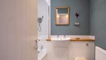 Your stylish bathroom has a shower over the bath.