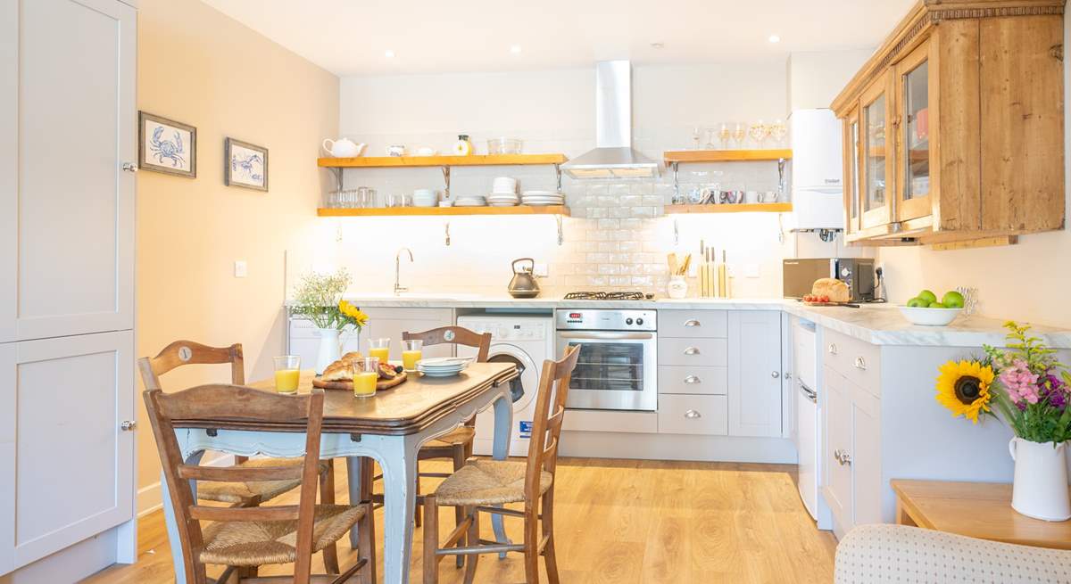 Gather everyone around the dining table to chat about the day ahead. 