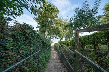 From Daisy Cottage the unmade lane leads you on foot to the stunning beach, just a few minutes away.