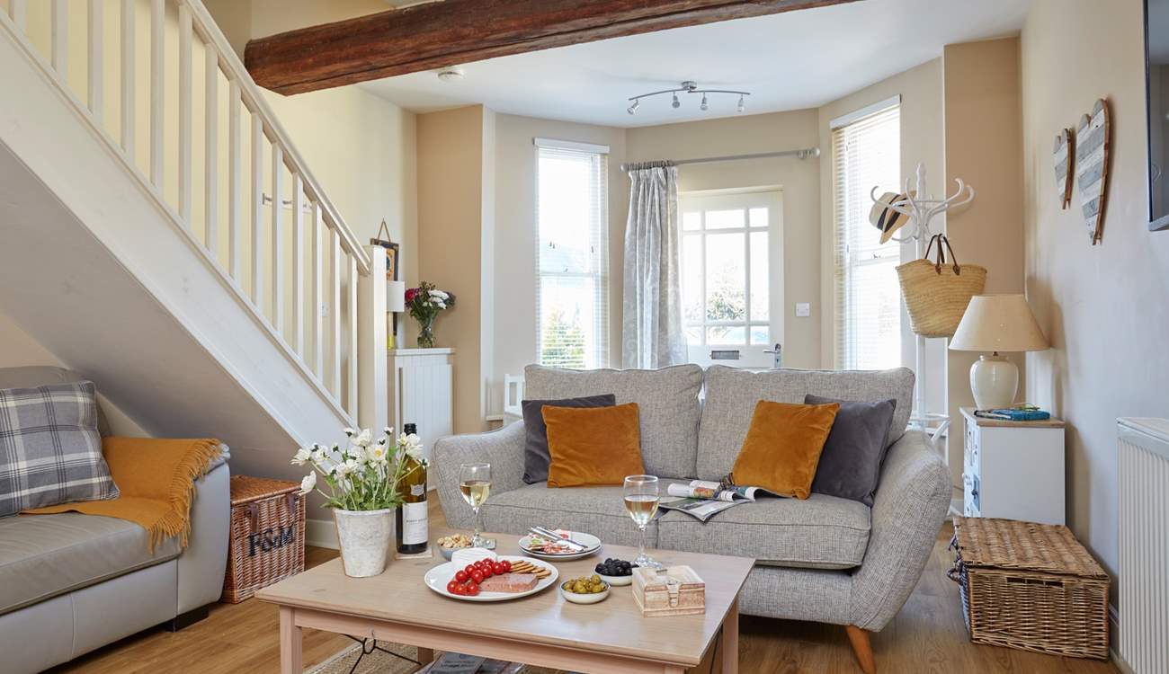 The sitting-room area of the open plan ground floor has space to relax, read and enjoy an afternoon glass of wine.