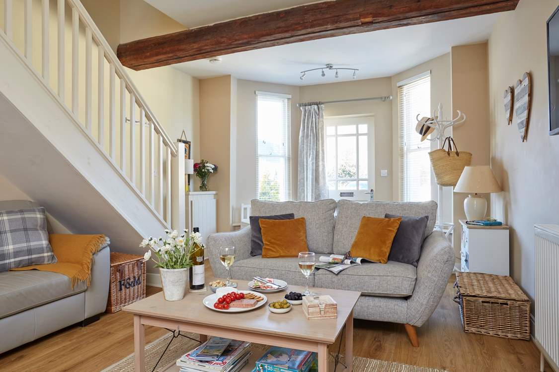 The sitting-room area of the open plan ground floor has space to relax, read and enjoy an afternoon glass of wine.