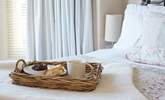 The pretty main bedroom with its comfy bed and morning treats. - Thumbnail Image