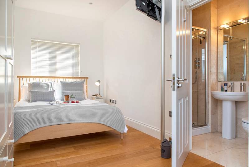 Bedroom 2 - enjoy lazy mornings in bed watching the TV before you enjoy a refreshing shower in your en suite shower-room to set you up for the day.