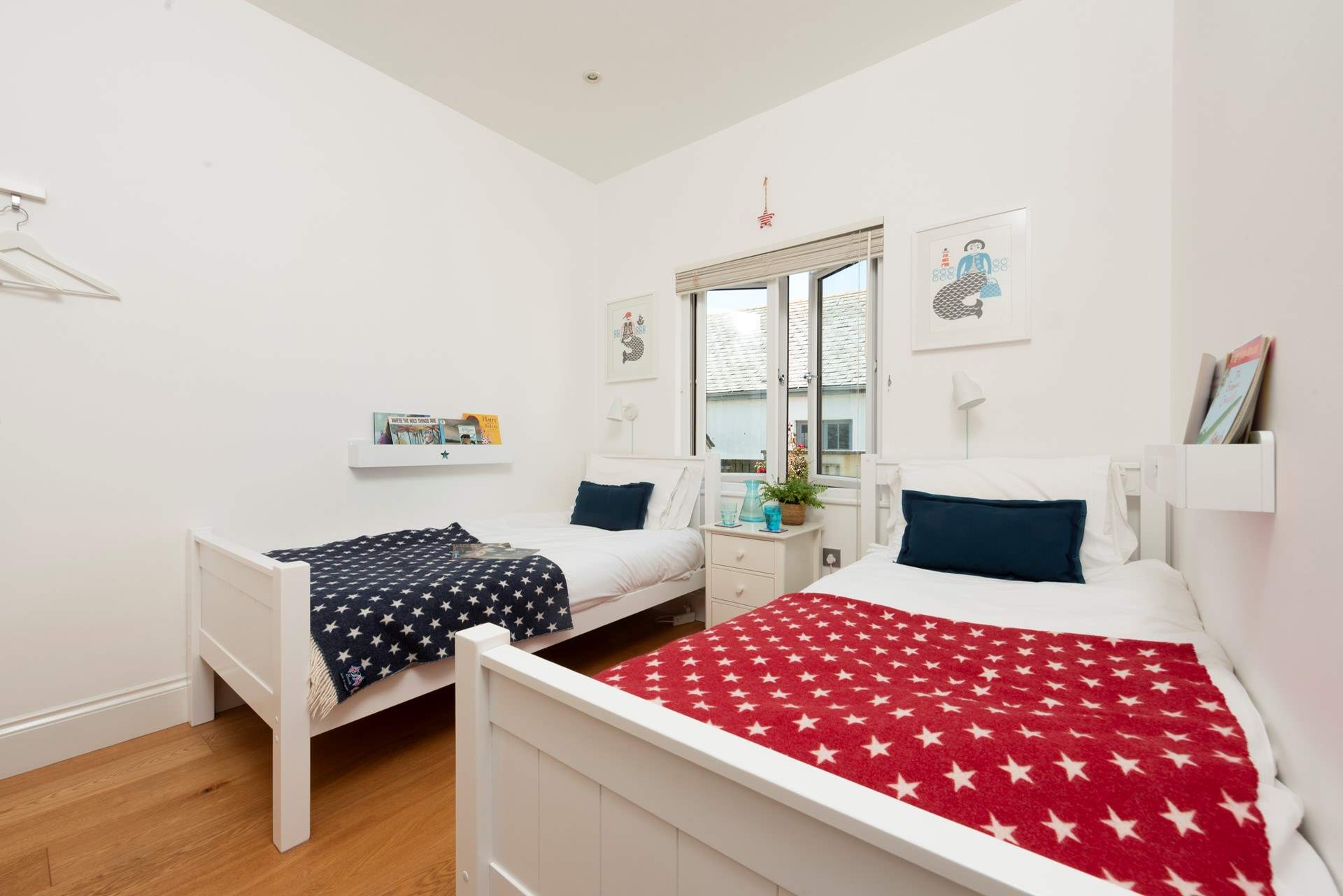 Twin beds await in Bedroom 3.