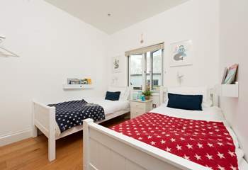 Twin beds await in Bedroom 3.