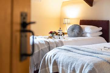 Cosy bedroom two with 'zip and link' bed.