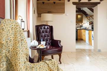 Enjoy an afternoon cuppa with a slice of cake in the chair by the window.
