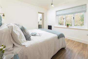 Bedroom 1 on the ground floor has a stylish en suite shower-room.