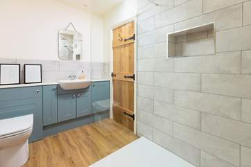 The en suite shower-room is simply fabulous and can be accessed from both bedroom 1 and from the kitchen.