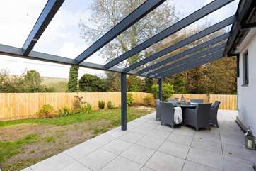 The outside space is perfect for al fresco dining.
