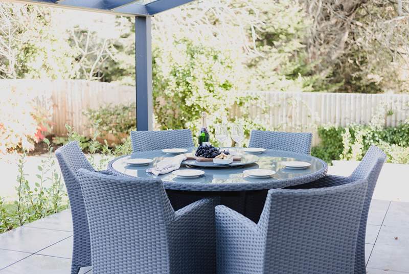 The outside space is perfect for al fresco dining.