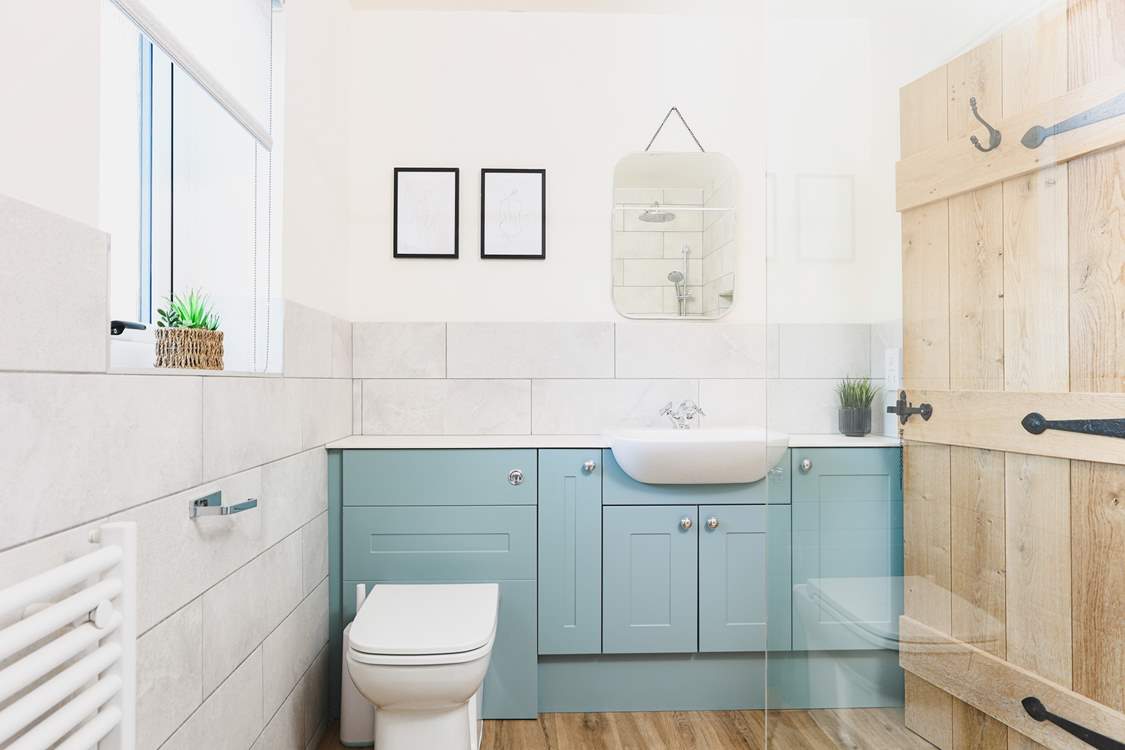 The en suite shower-room is simply fabulous and can be accessed from both bedroom 1 and from the kitchen.