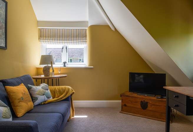 Also on the first floor is this cosy snug for a bit of quiet escapism.