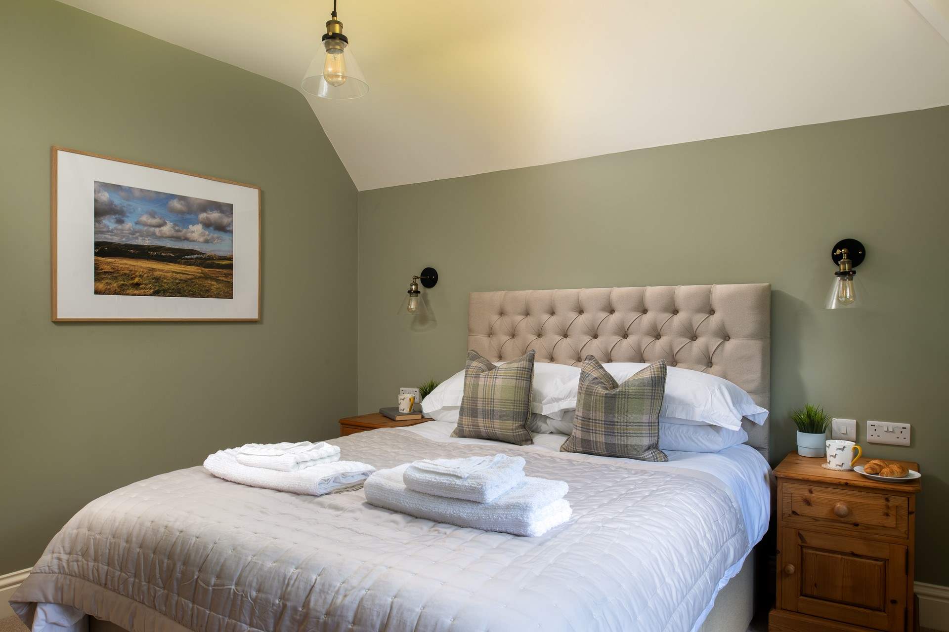 The third bedroom is beautifully styled.