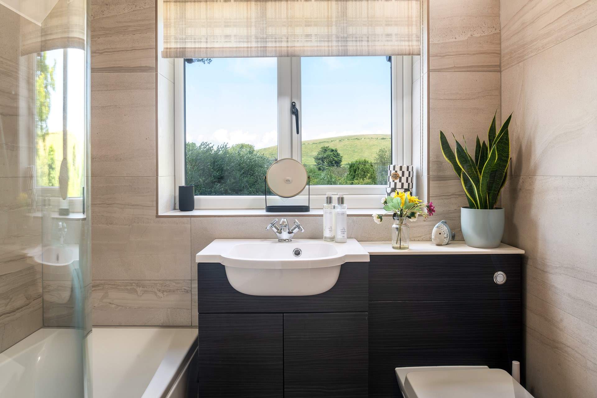The family bathroom is spacious with stunning views.