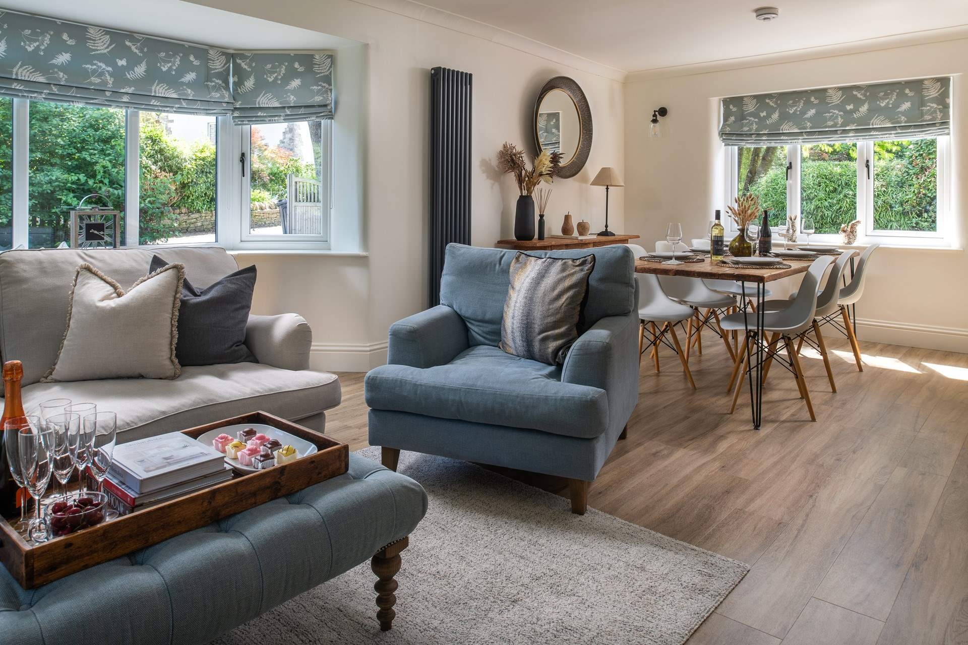 The sitting room opens up to the dining space so that everyone can gather together.
