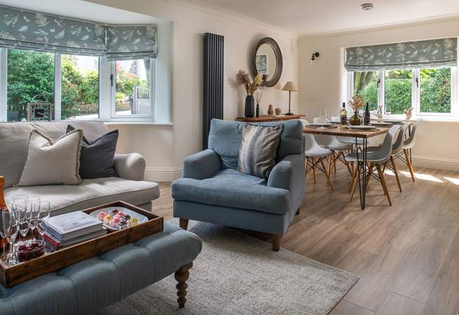 The sitting room opens up to the dining space so that everyone can gather together.