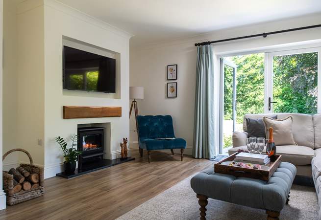 Cosy nights in are guaranteed with the lovely flame effect fire warming the room.