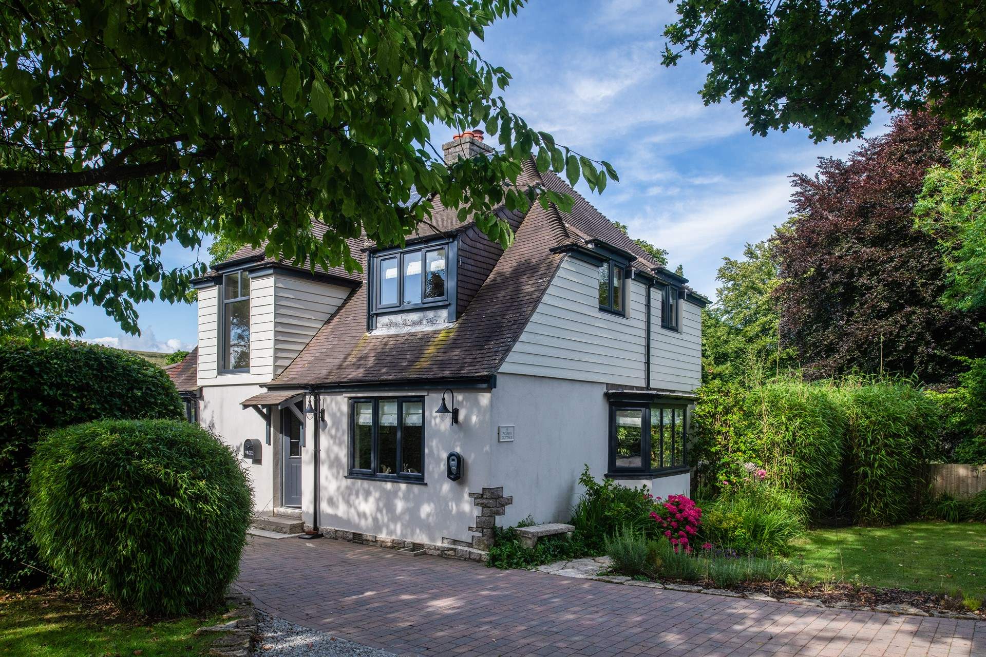 Acorns has a lovely position amongst mature landscaped gardens.