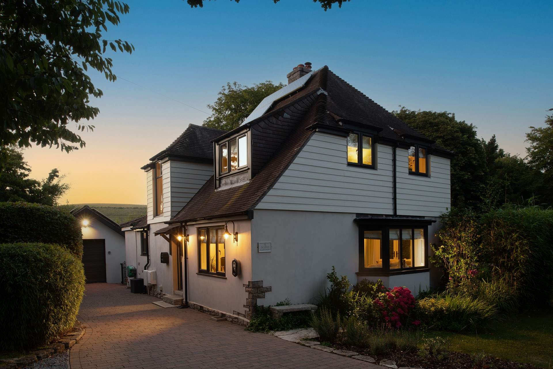 As night falls the home takes on such a warm and cosy feel.