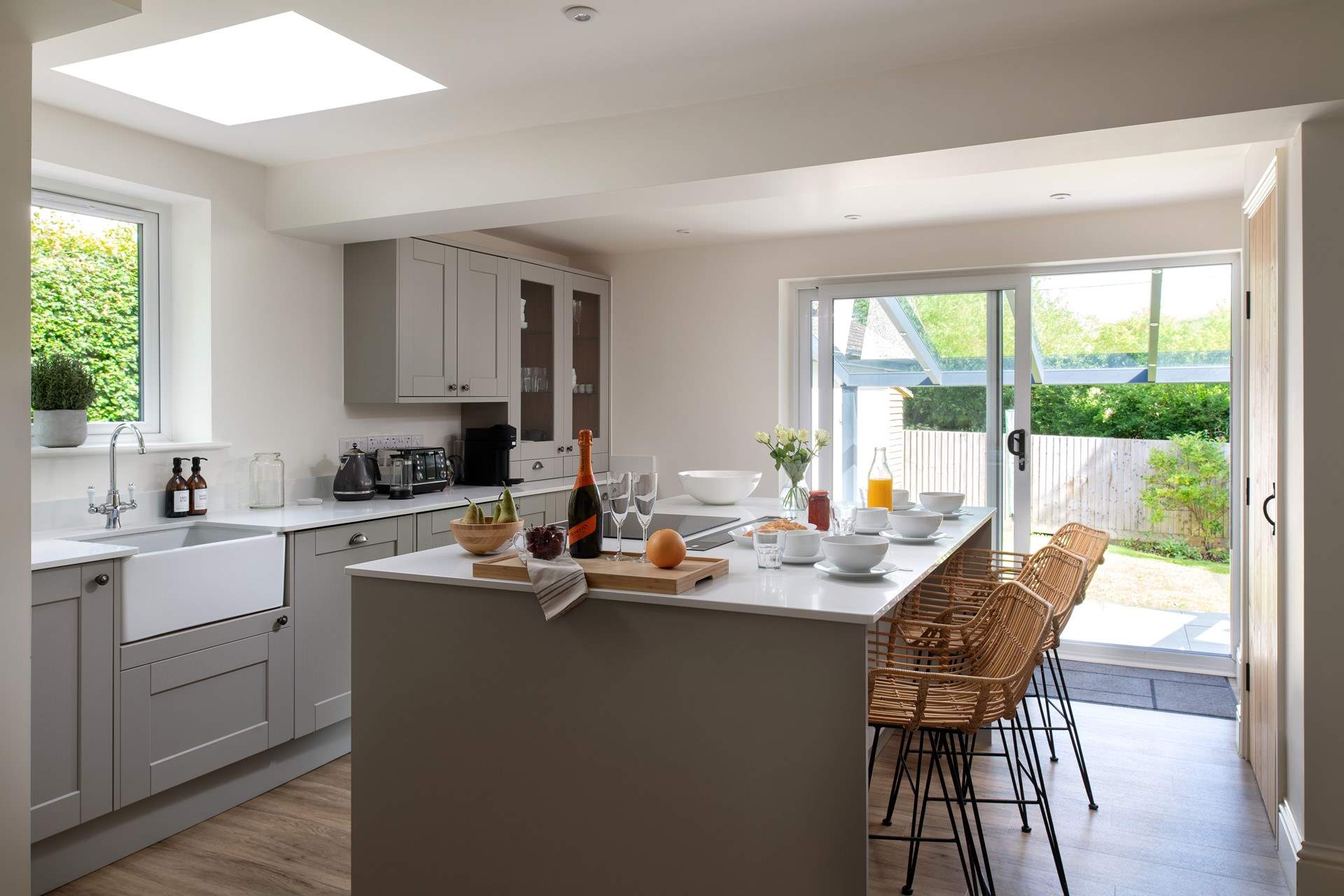 The kitchen opens out to the garden and has a wonderful feature island.