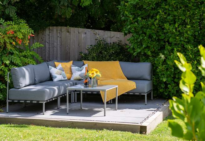 The wrap around garden has plenty of places to relax and unwind...
