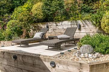 Or perhaps lounge in the sun all day long on the lovely raised terrace area.