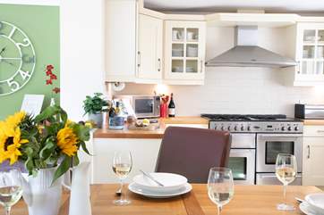 Light and bright, the kitchen/diner is a lovely place to spend time.