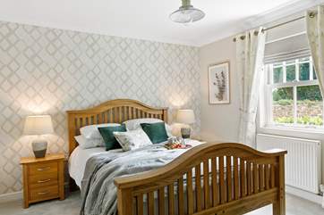 Luxurious bedroom 1 is on the ground floor and has the added benefit of an en suite shower-room.