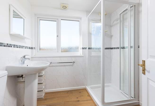 En suite shower-room to bedroom three.