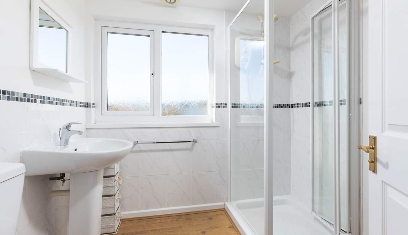 En suite shower-room to bedroom three.