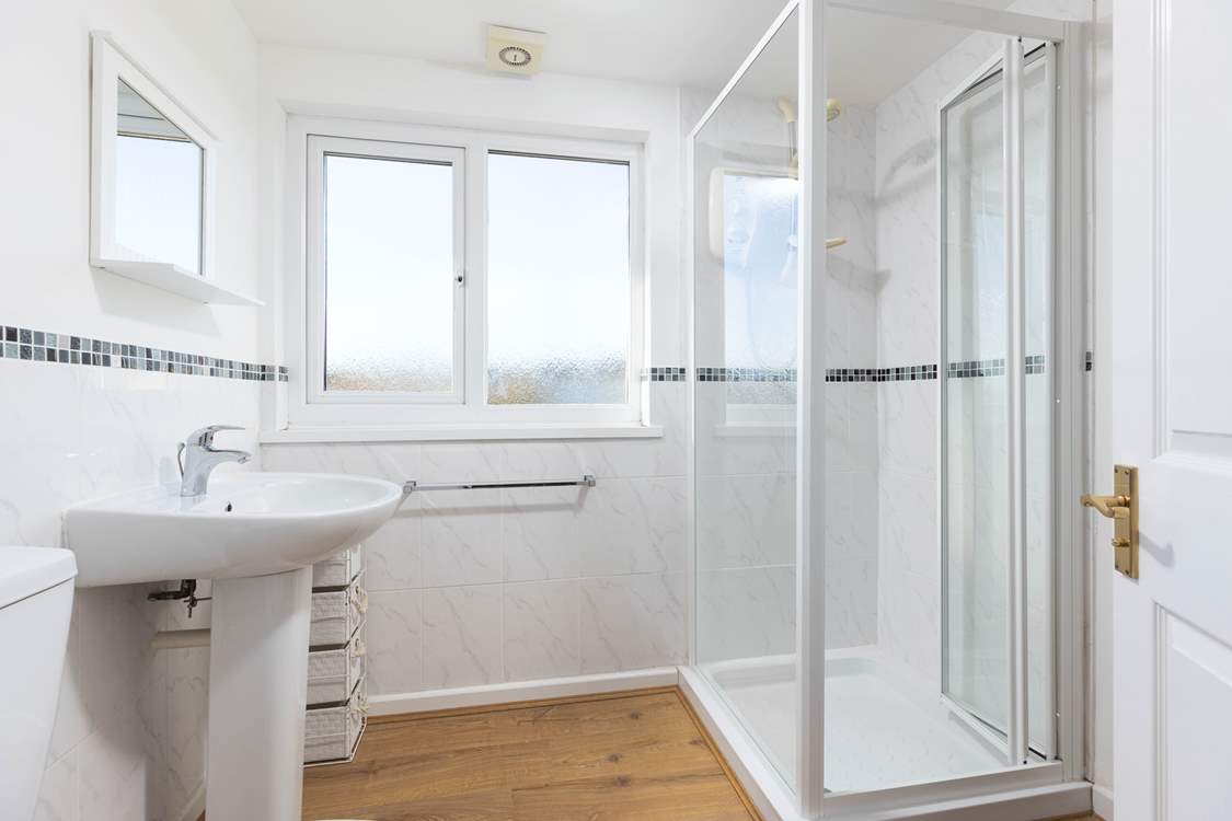 En suite shower-room to bedroom three.