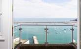 Step out onto your balcony from bedroom two, and breathe in the fresh sea air. - Thumbnail Image