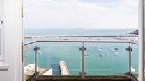 Step out onto your balcony from bedroom two, and breathe in the fresh sea air.