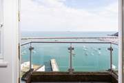 Step out onto your balcony from bedroom two, and breathe in the fresh sea air.