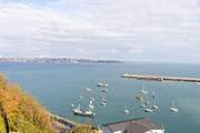 Looking out across the water in the direction of Torquay, Exmouth and the Jurassic coastline beyond. You can see for miles and miles on a clear day.