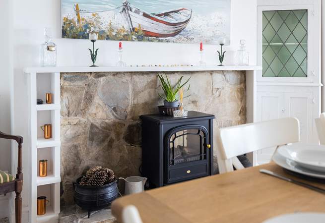 For the chillier evenings, pop on the wood-burner effect electric stove for that instant feeling of warmth and cosiness.