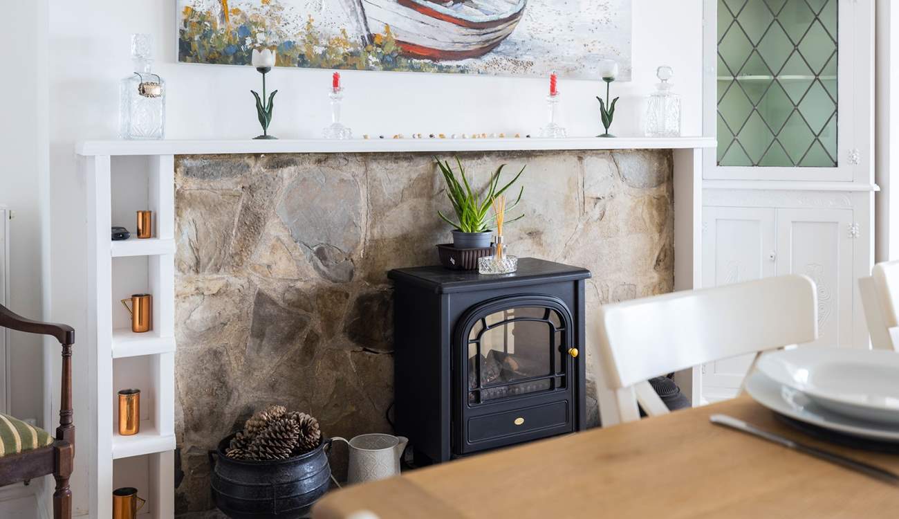 For the chillier evenings, pop on the wood-burner effect electric stove for that instant feeling of warmth and cosiness.