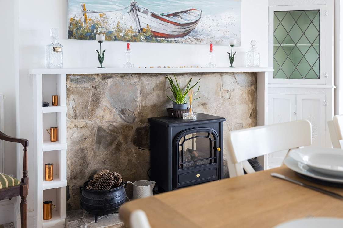 For the chillier evenings, pop on the wood-burner effect electric stove for that instant feeling of warmth and cosiness.