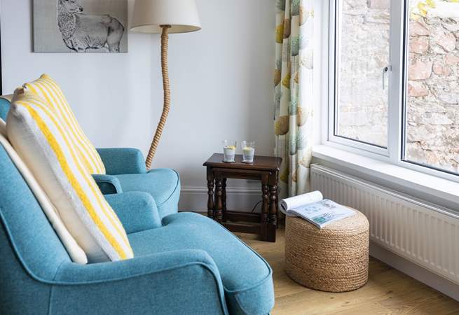 The lower ground floor kitchen and dining area also provide a comfy seating area. Soaking up the views with a good book is just the ticket.