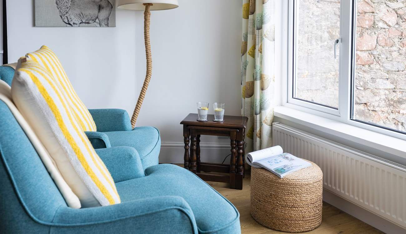 The lower ground floor kitchen and dining area also provide a comfy seating area. Soaking up the views with a good book is just the ticket.