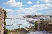 Step out of the lower ground floor snug area, down the steps and you will feel so close to the water, you could reach out and touch it.