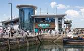 Brixham harbour is home to many award-winning restaurants, which are complemented further by numerous wine bars, cocktail bars, and cute and welcoming cafes and beach huts. - Thumbnail Image