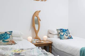 Bedroom three has twin beds.