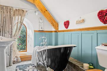 Fabulous interiors include the most magical roll-top bath.