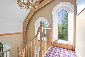 The arched windows let the light floor in.